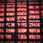 Borse USA in ribasso, tecnologia sotto pressione e incertezze economiche